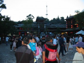 IMG_6137 The square in Lijiang's Old Town was once a quaint place where Naxi (the local minority group) traders came to sell snacks, small wares, and some of their handicrafts. Today, it is a boisterous place with booming karaoke music, pop music from nearby bars, and hordes of tourists.