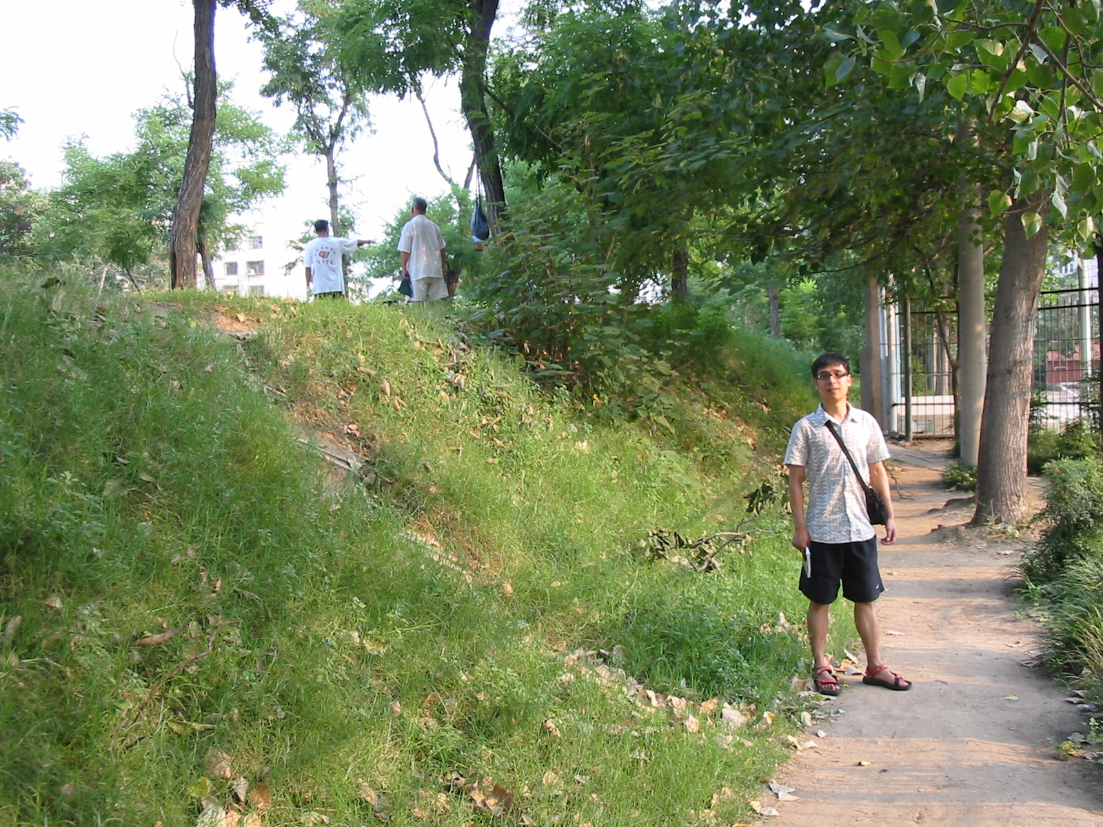 Walking next to the mounds that mark the Shang Dynasty Wall Ruins